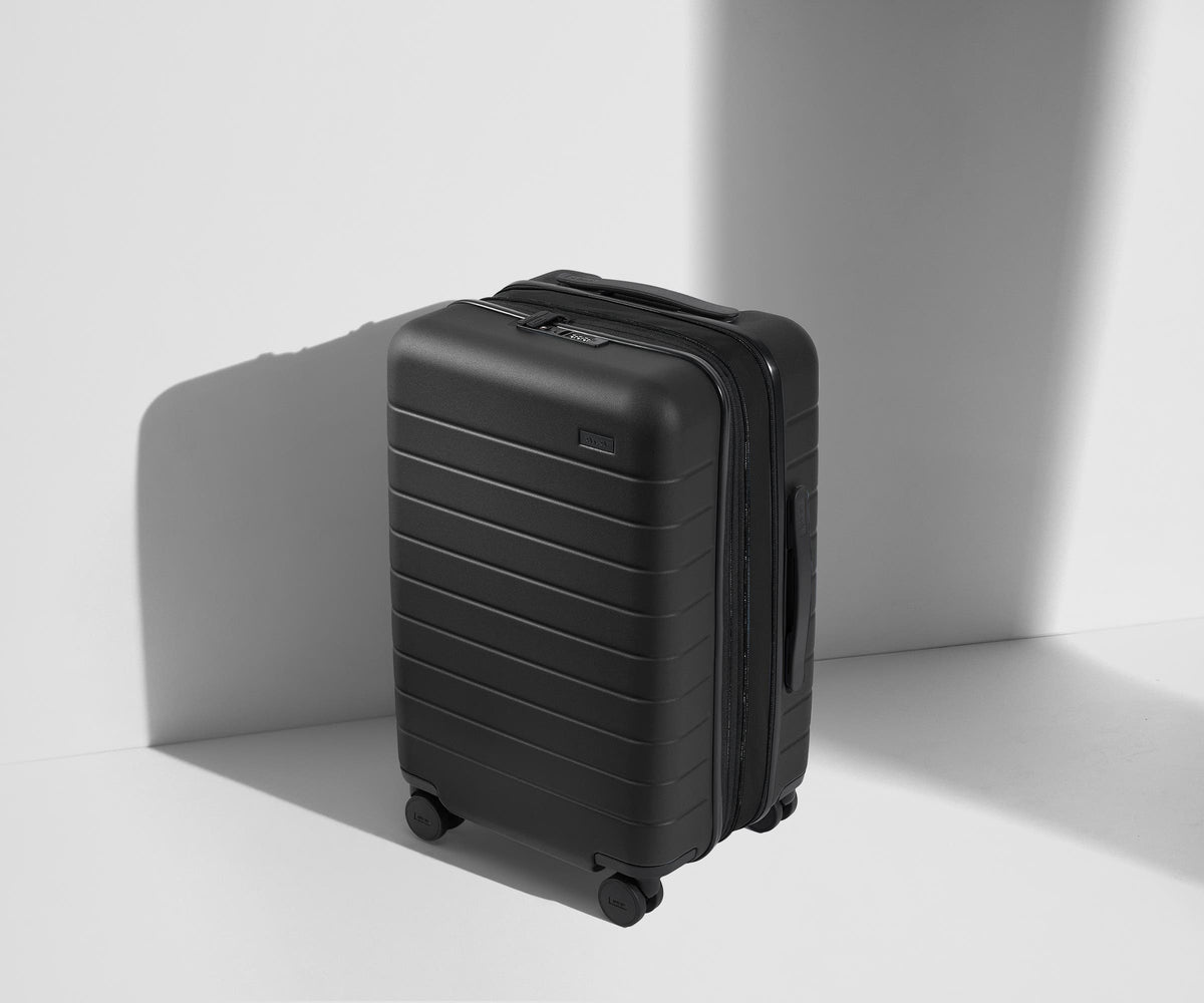 Away The Carry-On Flex, carry-on suitcase, 21.7 by 14.4 by 9 inches